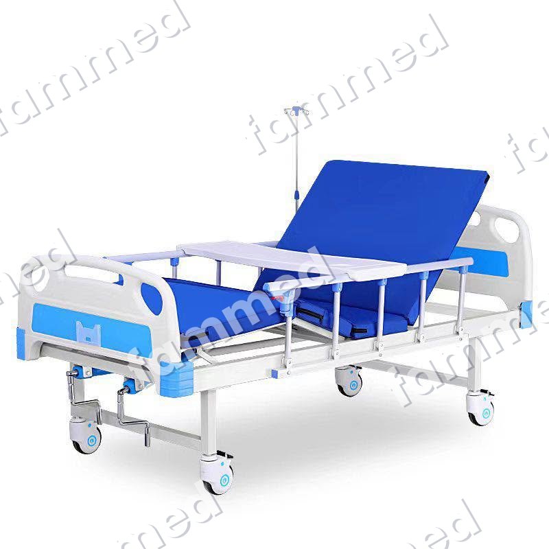Lit médicalisé manuel avec table