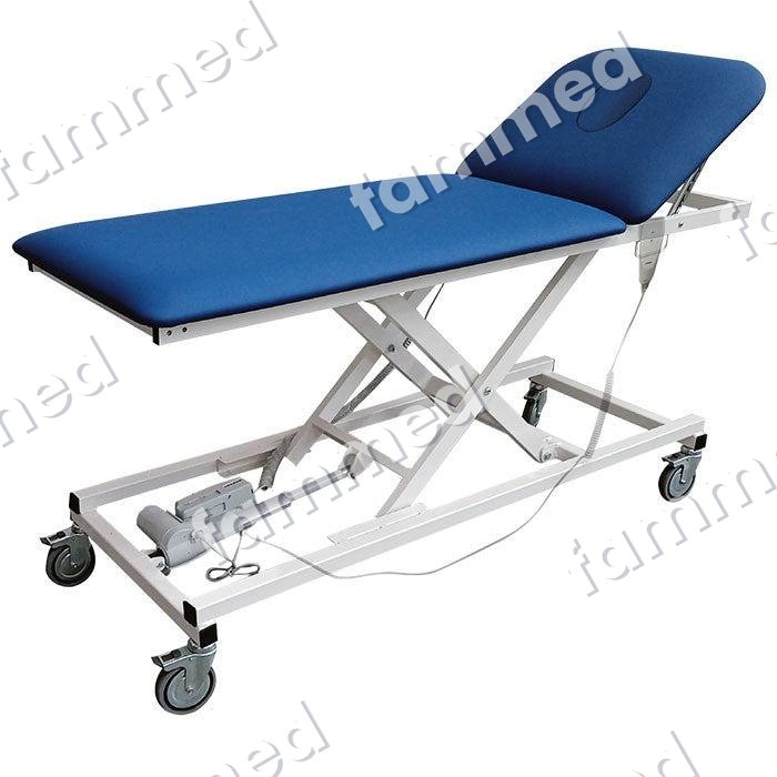 Table d'examen bleue sur ciseaux